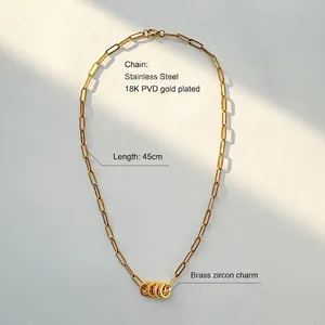 Close-up of 18K PVD gold plated stainless steel chain with a zircon oval pendant