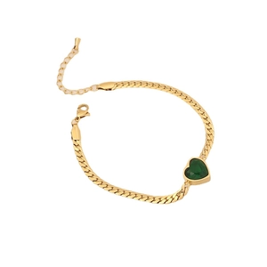 Elegant gold Cuban chain necklace with a green heart crystal and adjustable lobster clasp