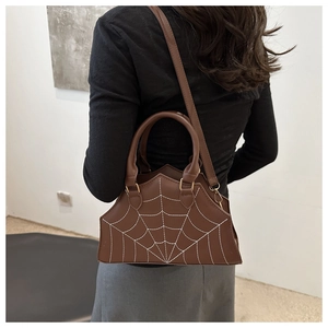 Brown PU leather shoulder bag with white spider web stitching detail and long strap