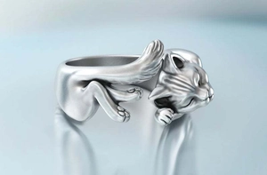 Macro view of matte silver cat ring showing intricate details and lifelike texture