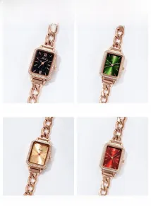 Detail view of four rectangular women's watches in black green gold and red dial colors