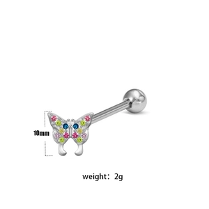 Detail showing 10mm butterfly tongue ring with colorful crystals and 2g weight mark