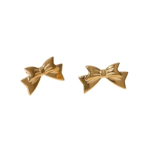 Minimalist gold bow stud earrings in stainless steel on a white background