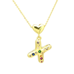 Detail of gold letter X pendant with colorful cubic zirconia and heart link connector