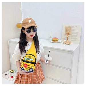 Detail of cute yellow school bus chest bag with school bus text and stop sign logo