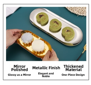 Top view of gold and silver oval stainless steel trays with mirror polished finish