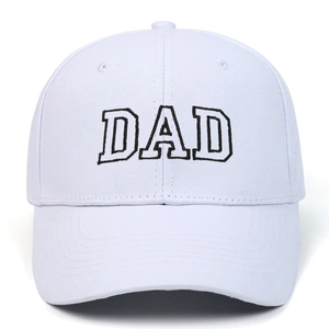 Detailed view of the 3D black embroidered DAD lettering on a white cotton baseball cap