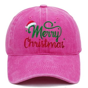 Close-up of Merry Christmas embroidery on rose red washed denim baseball cap