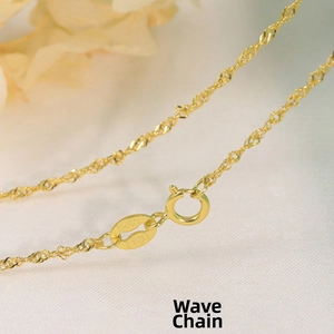 Close-up of golden S925 sterling silver water wave chain with Italy engraved hallmark