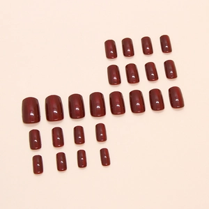 Deep cherry red cat eye press-on nails in 24-piece set with a glossy finish