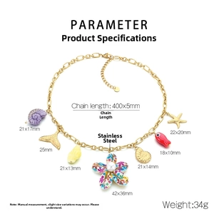 Detailed view of marine charms like starfish and shells on 18k gold plated chain