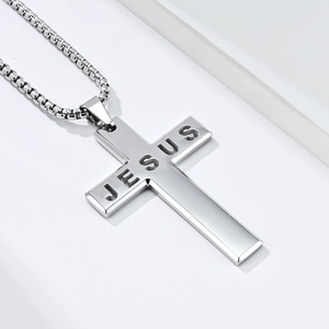 Polished silver stainless steel cross necklace featuring JESUS engraving on box chain