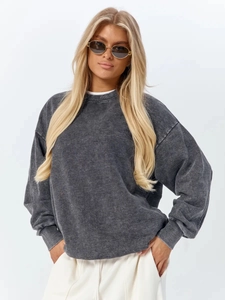 Macro shot of washed gray cotton fabric texture and ribbed neckline on sweatshirt