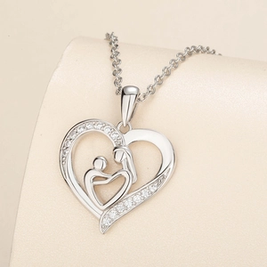 Silver mother and child heart necklace with sparkling crystals on minimalist chain