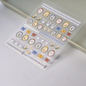 3D embossed nail stickers featuring cute rabbit and floral patterns in a sweet style