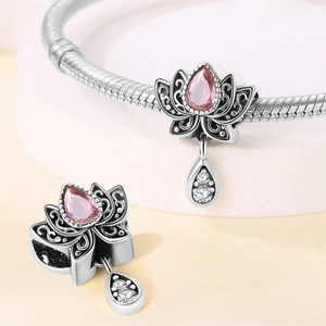 Silver lotus charm bead with pink drop zircon for star-themed bracelets