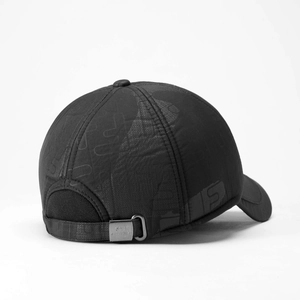 Detail of black winter wool baseball cap featuring metal adjustment buckle and ear flaps