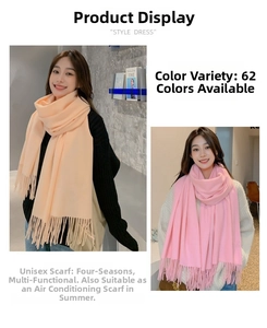 Detail view of peach and light pink long scarves featuring elegant fringe edge design