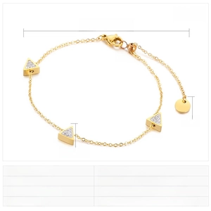 Detailed view of adjustable gold stainless steel bracelet with sparkling triangle rhinestones