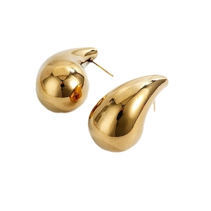 Polished gold teardrop stud earrings with a sleek minimalist chunky metal design