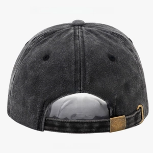 Detail view of the washed grey baseball cap showing its metal buckle and adjustable strap