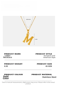 Detail of gold stainless steel M pendant with tree bark texture and dimension labels