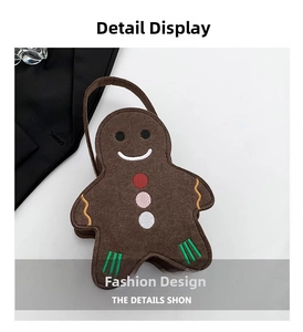 Détail d'un sac cadeau bonhomme de pain d'épices en feutre marron avec broderies
