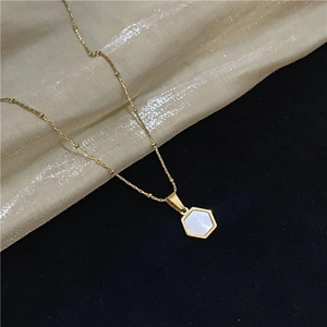 Elegant gold titanium steel necklace featuring a hexagonal natural shell pendant on a bead chain