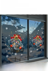 Detailed view of Christmas bell window stickers with reindeer and golden stars decals