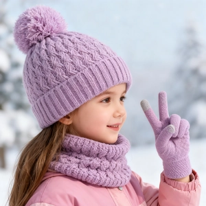 Close-up of kids winter set with purple cable knit hat, scarf and touchscreen gloves