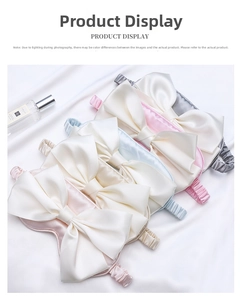 Detailed view of silk bow sleep masks in multiple pastel colors on elegant fabric