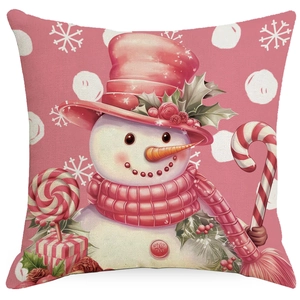 Christmas linen pillowcase featuring a festive snowman illustration on pink background