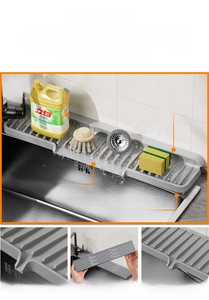 Detail view of the narrow silicone drainage mat showing the sloped water outlet design