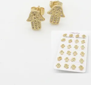 Detail of 18k gold plated Hamsa Hand stud earrings with sparkling cubic zirconia stones