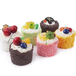Realistic artificial PU mousse cake set with cream and fruit decor on white background