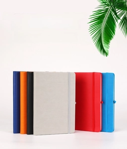 A5 bandage notebooks in six assorted colors with matching elastic bands and faux leather covers
