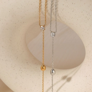 Elegant Y-shaped stainless steel necklaces with zircon studs and gold or silver teardrop pendants