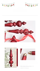 Detailed view of red metallic spire Christmas ornaments with electroplated finish