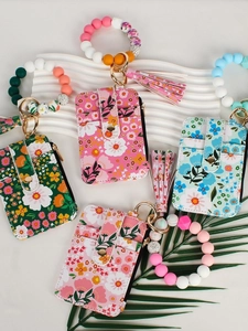 Floral PU leather card holder keychain with silicone beads and stylish tassel fringe