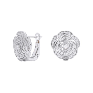 Detailed macro view of S925 sterling silver camellia earrings with pavé cubic zirconia