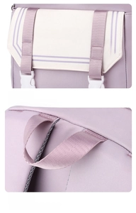 Detail of purple backpack featuring 'beautiful' print, buckle, and durable hanging strap