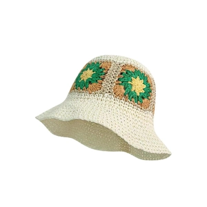 Japanese style woven straw bucket hat with colorful sunflower embroidery for sun protection