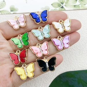 Pendentifs papillons colorés avec monture dorée et strass pour la création de bijoux DIY