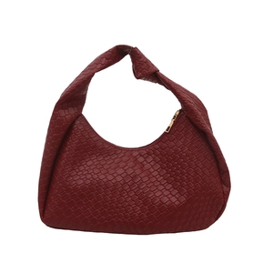 Dark red woven hobo bag with a knotted handle and classic Intrecciato pattern