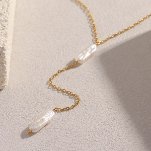 Minimalist 18K gold plated stainless steel Y-necklace with Baroque pearl tassels