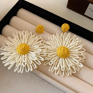 Handmade yellow chiffon flower earrings with pearl tassels in a beige jewelry box