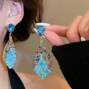 Bohemian crystal oval stud earrings with rainbow tassels and colorful pavé rhinestones