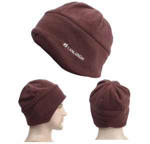 Detail showing the burgundy fleece texture and white embroidery on the winter hat
