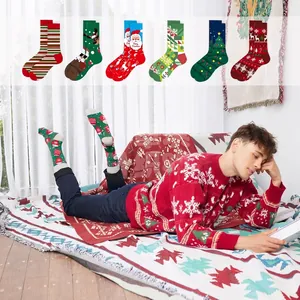 Festive Christmas mid-calf socks collection with Santa and reindeer patterns for adults