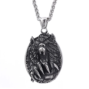 Detailed view of punk bear claw pendant with intricate silver steel carving texture